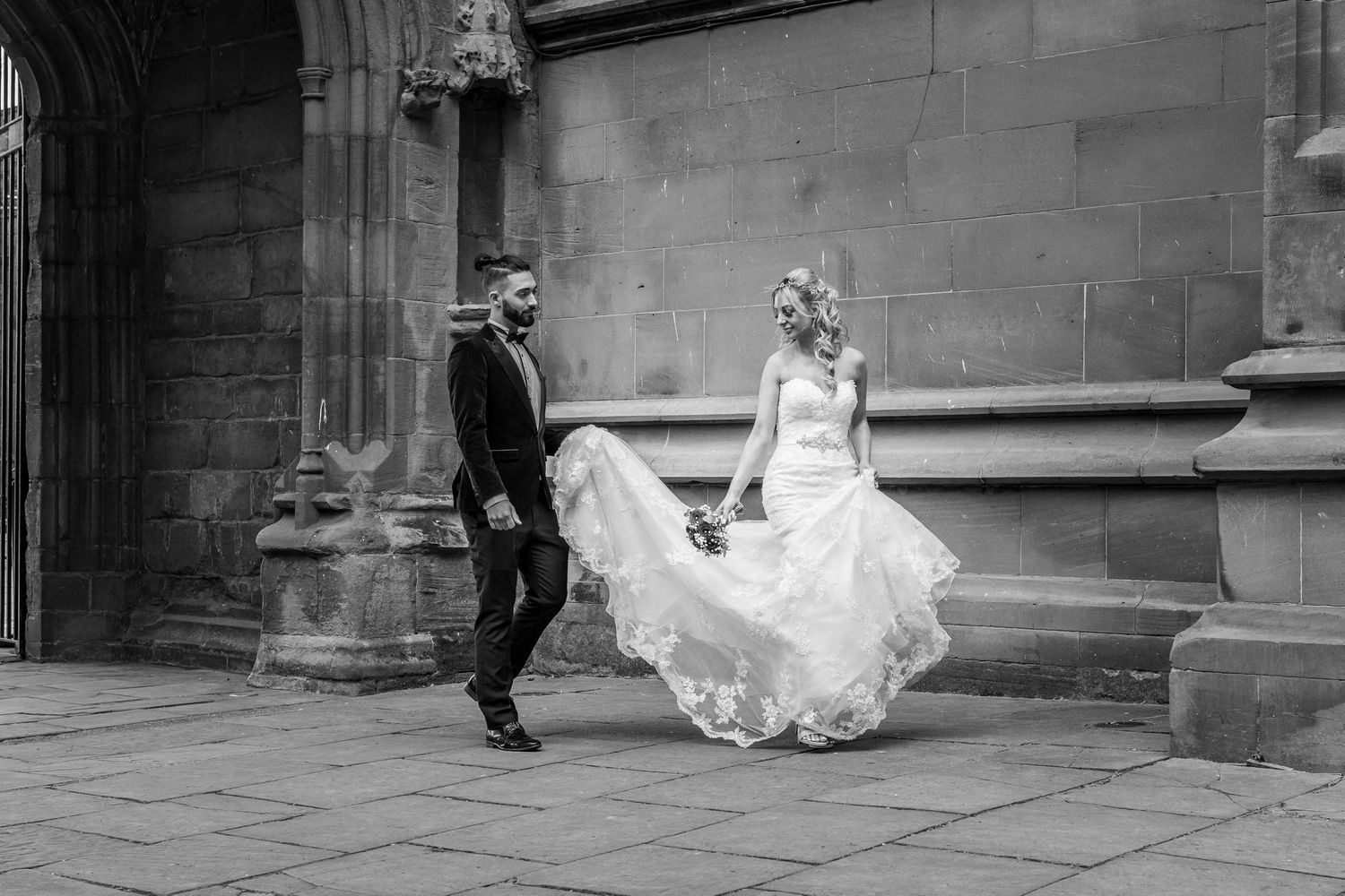Bride and groom outside coventry cathedral