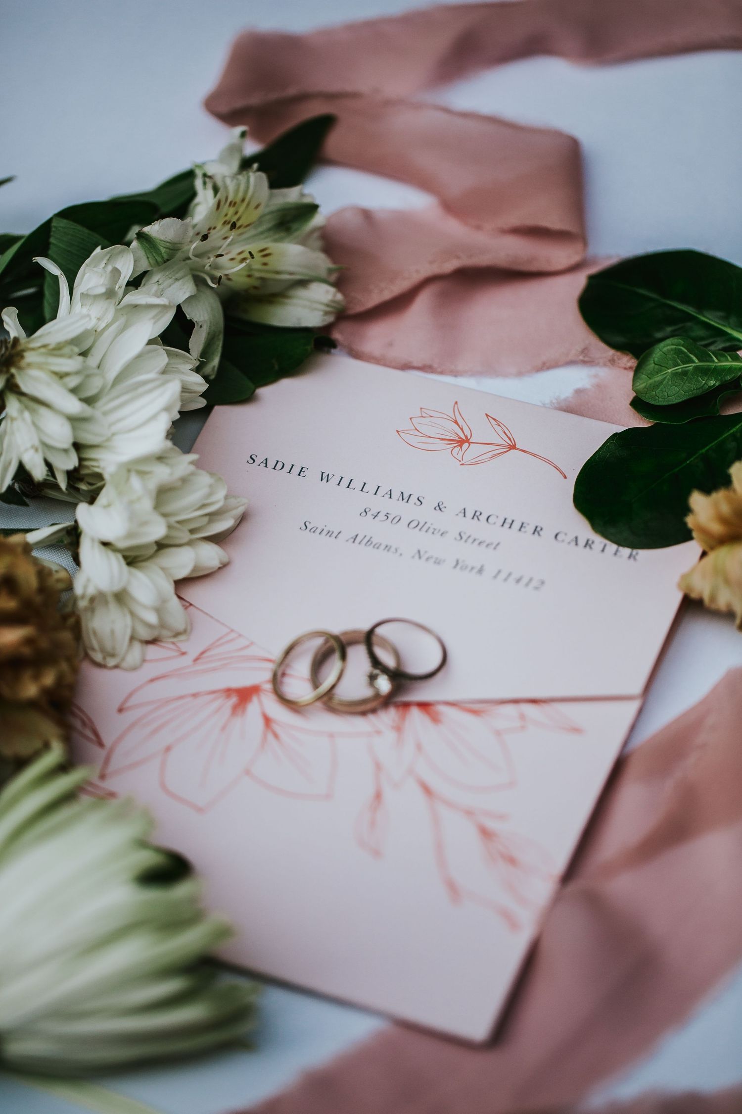 rebecca skidgel photography napa wedding photographer invitations flat lay photos flowers rings ribbons basic invite