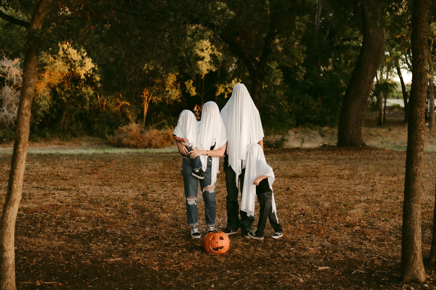 A Spooky Sheet Ghost and Pumpkin Head Halloween Family Photo Session in Seguin, Texas | Katy Montoya Photography