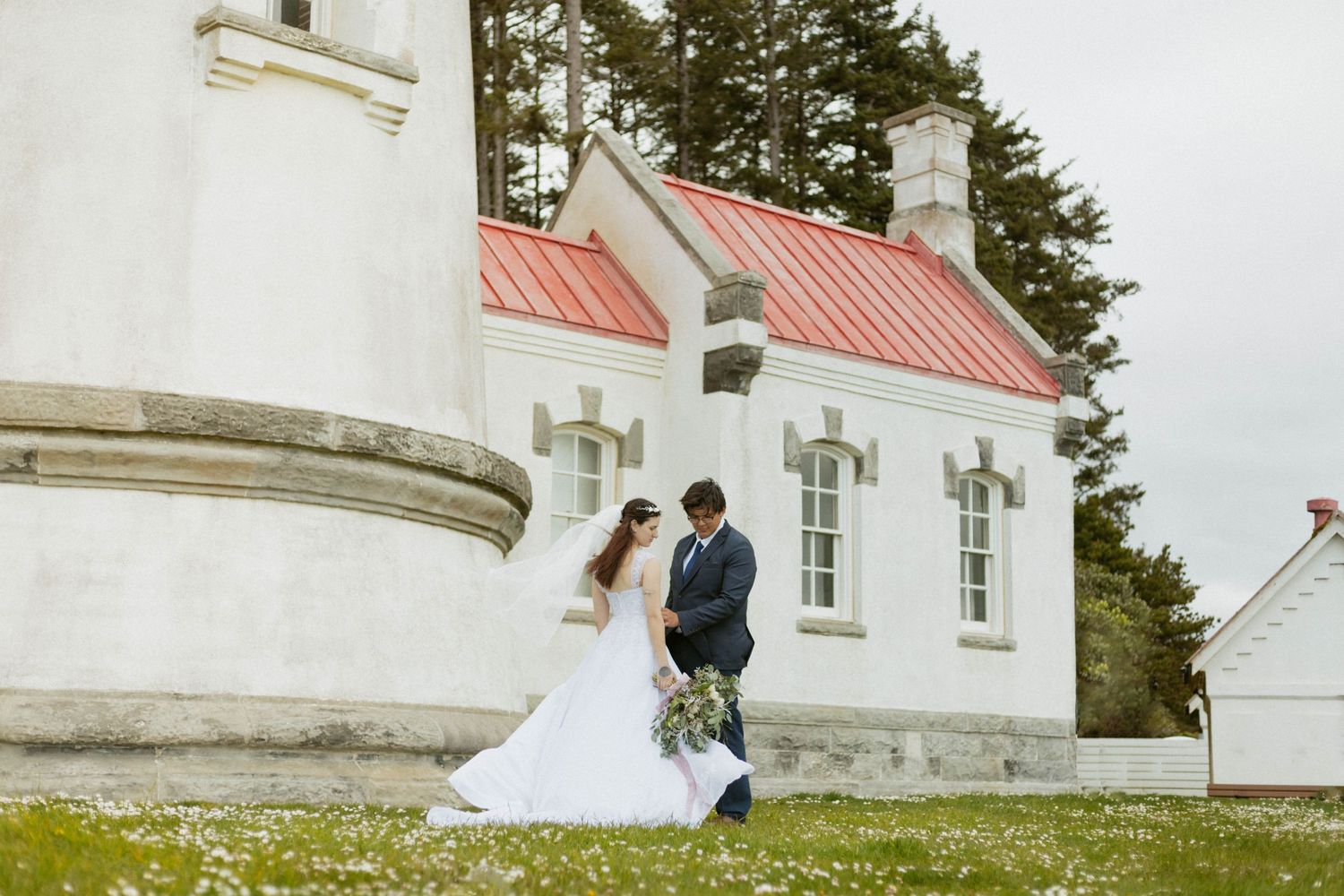 Couple eloping at Hecata Head Lighthouse in Florence, Oregon