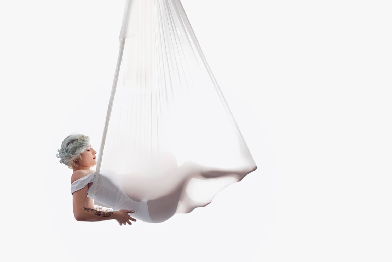 Luxury maternity session in aerial silk in Lawrence Kansas