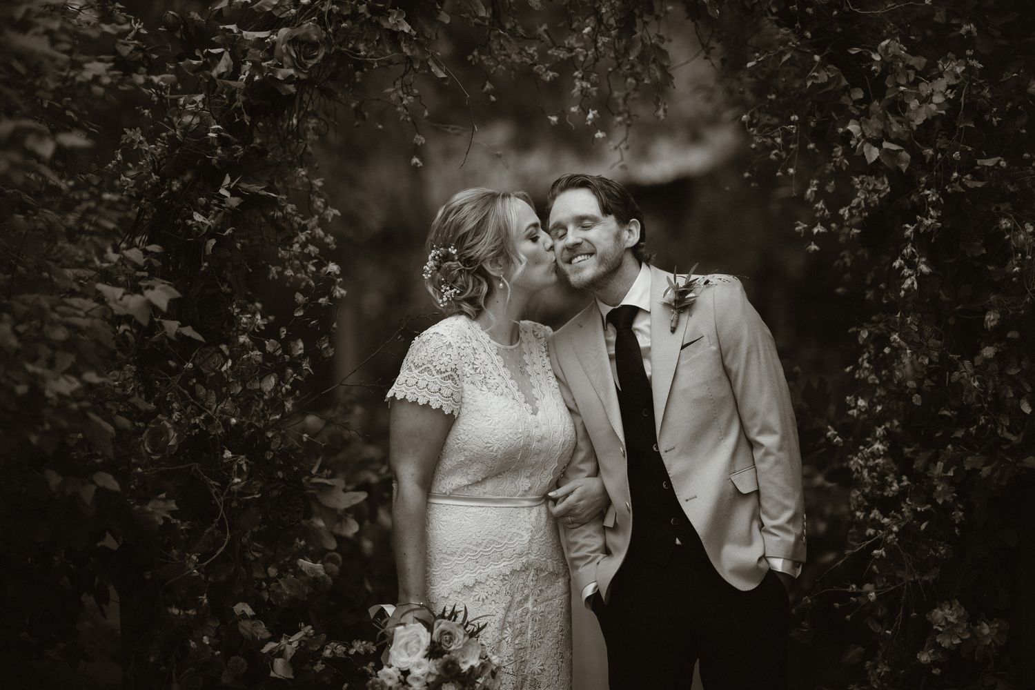 A black-and-white portrait of Rachel and Eoin together on their wedding day at BrookLodge.