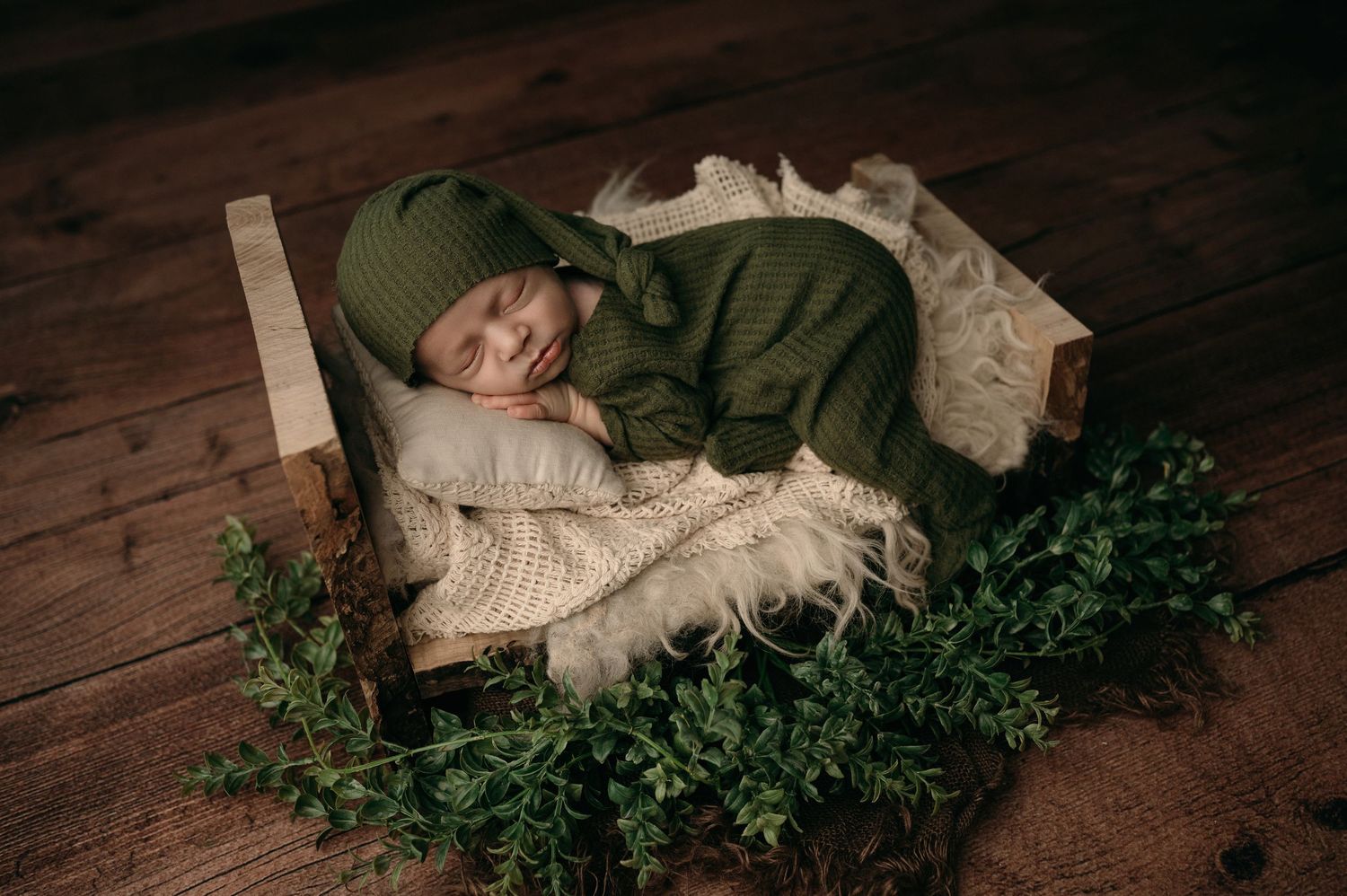 A collection of intimate dark brown toned family portrait photographs with soft lighting captures tender embraces.
