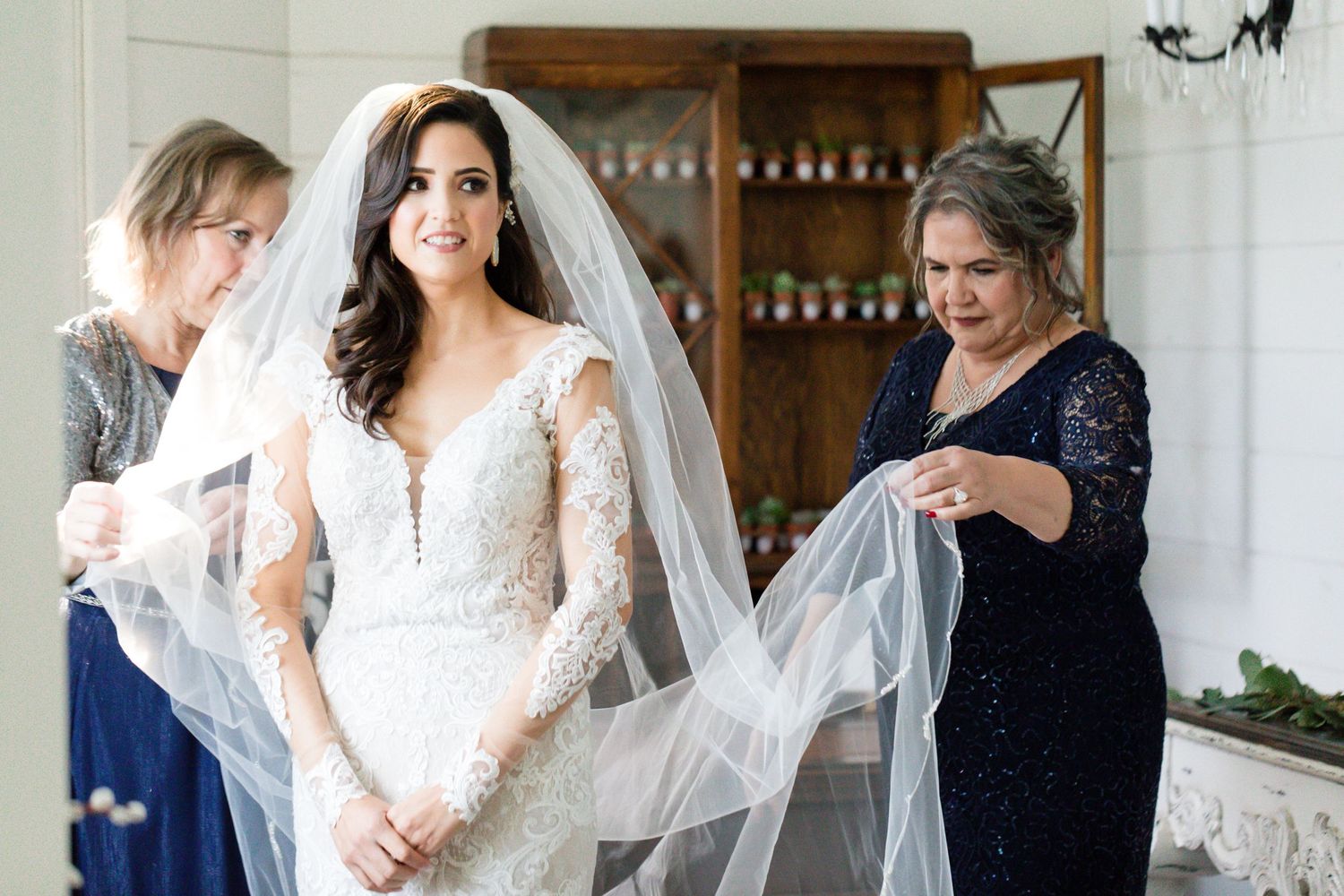 Bride and mother getting ready for the wedding ceremony in Dallas, Texas.