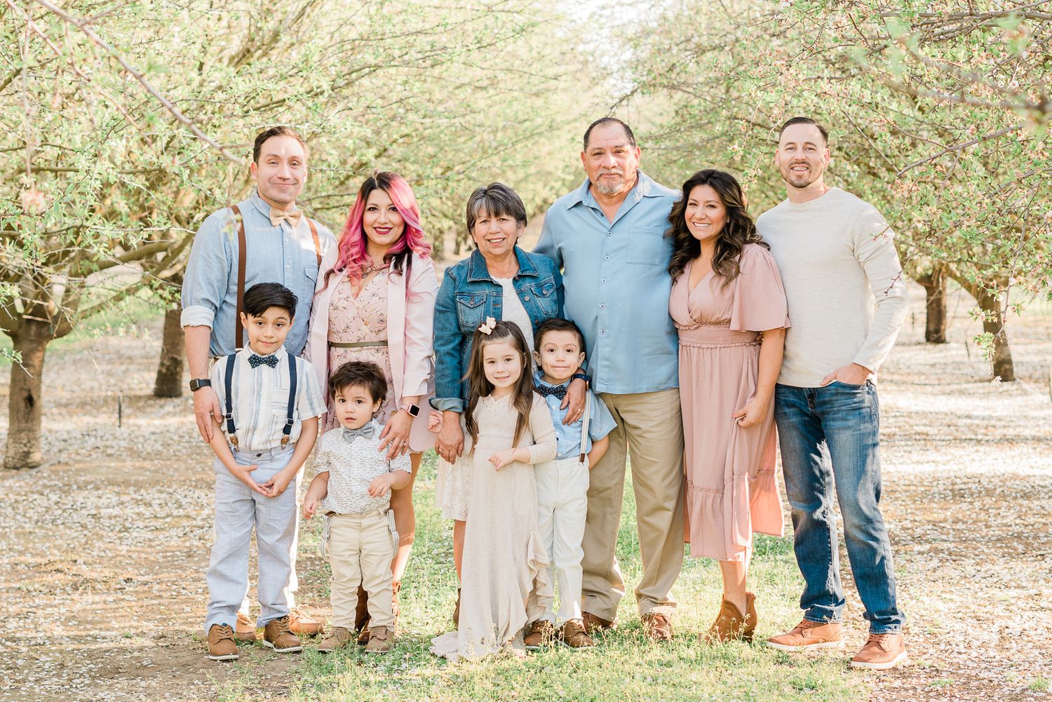 Extended family session in Madera, Ca in almond orchard