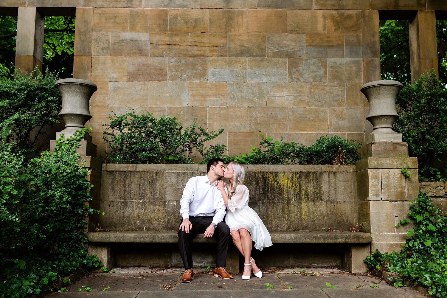 Beautiful engagement couple in the Greek Cultural Gardens in Cleveland Ohio