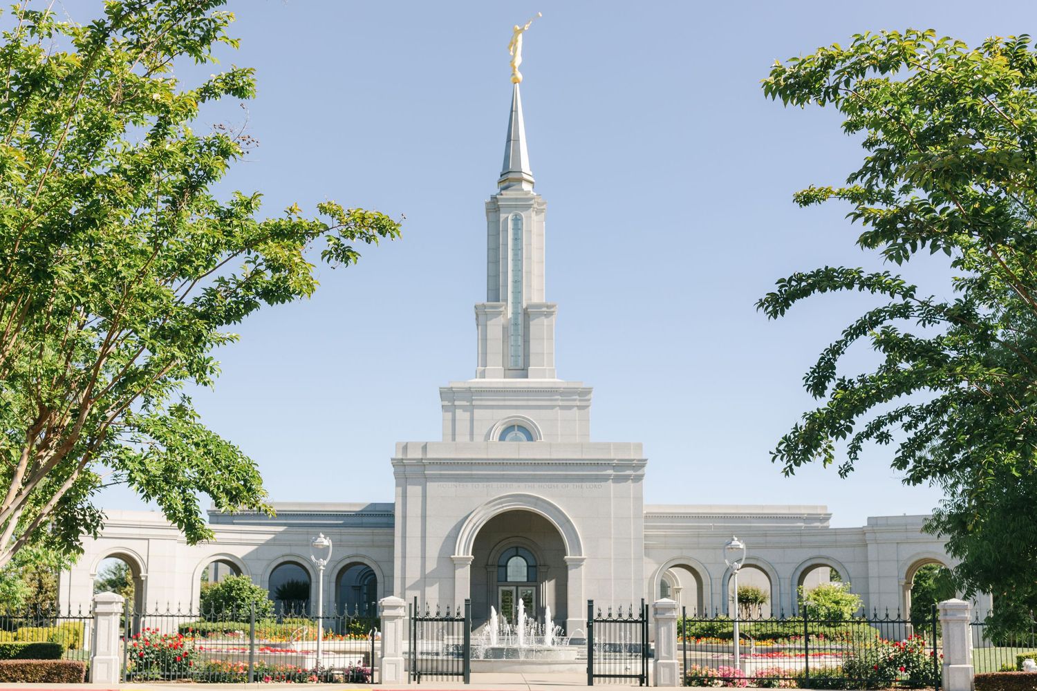 LDS Sacramento Temple at noon light with fountains captured by Chelsee Rawe Photography