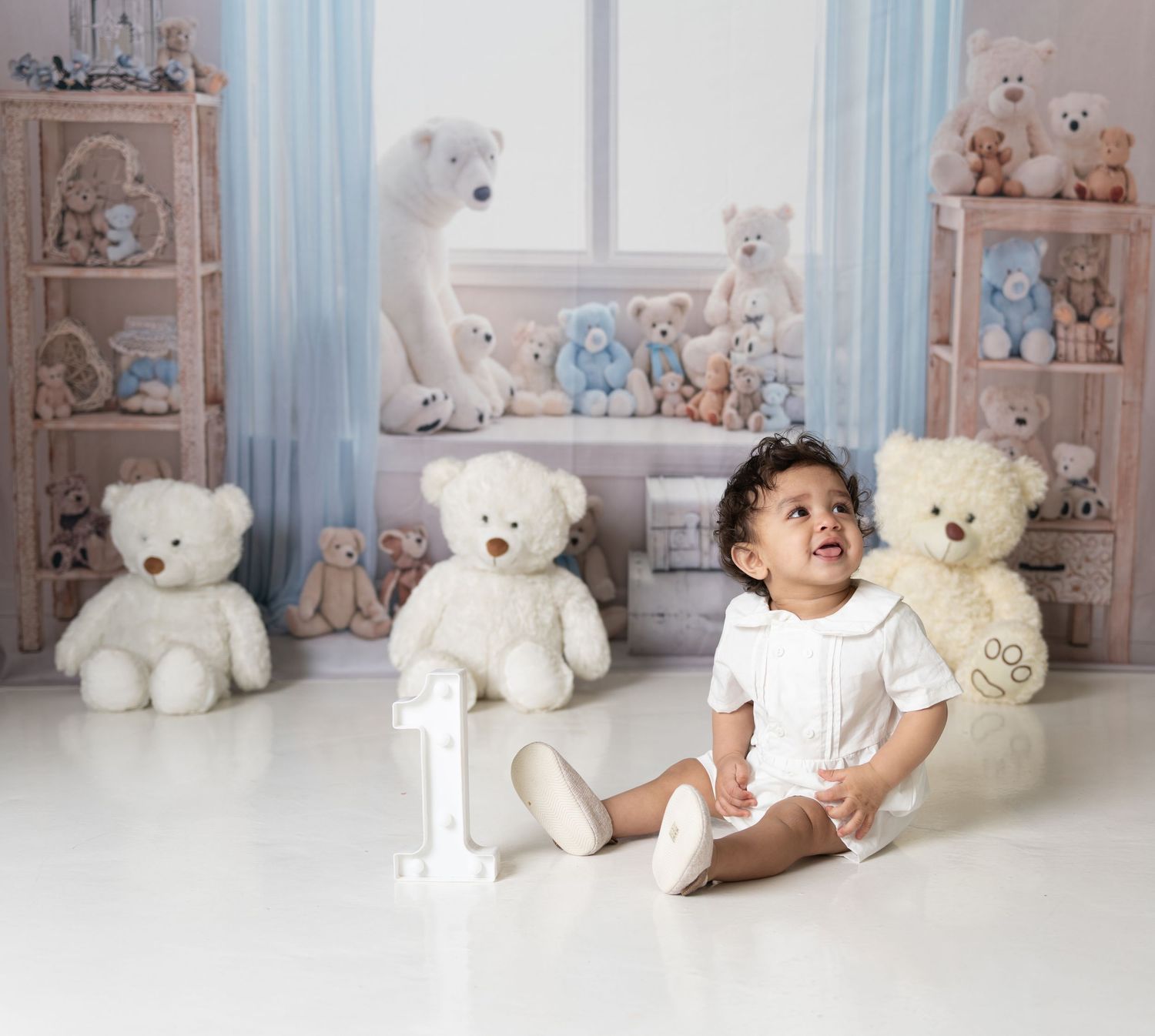Baby in a colorful cake smash photoshoot at Mohastudio Dubai.