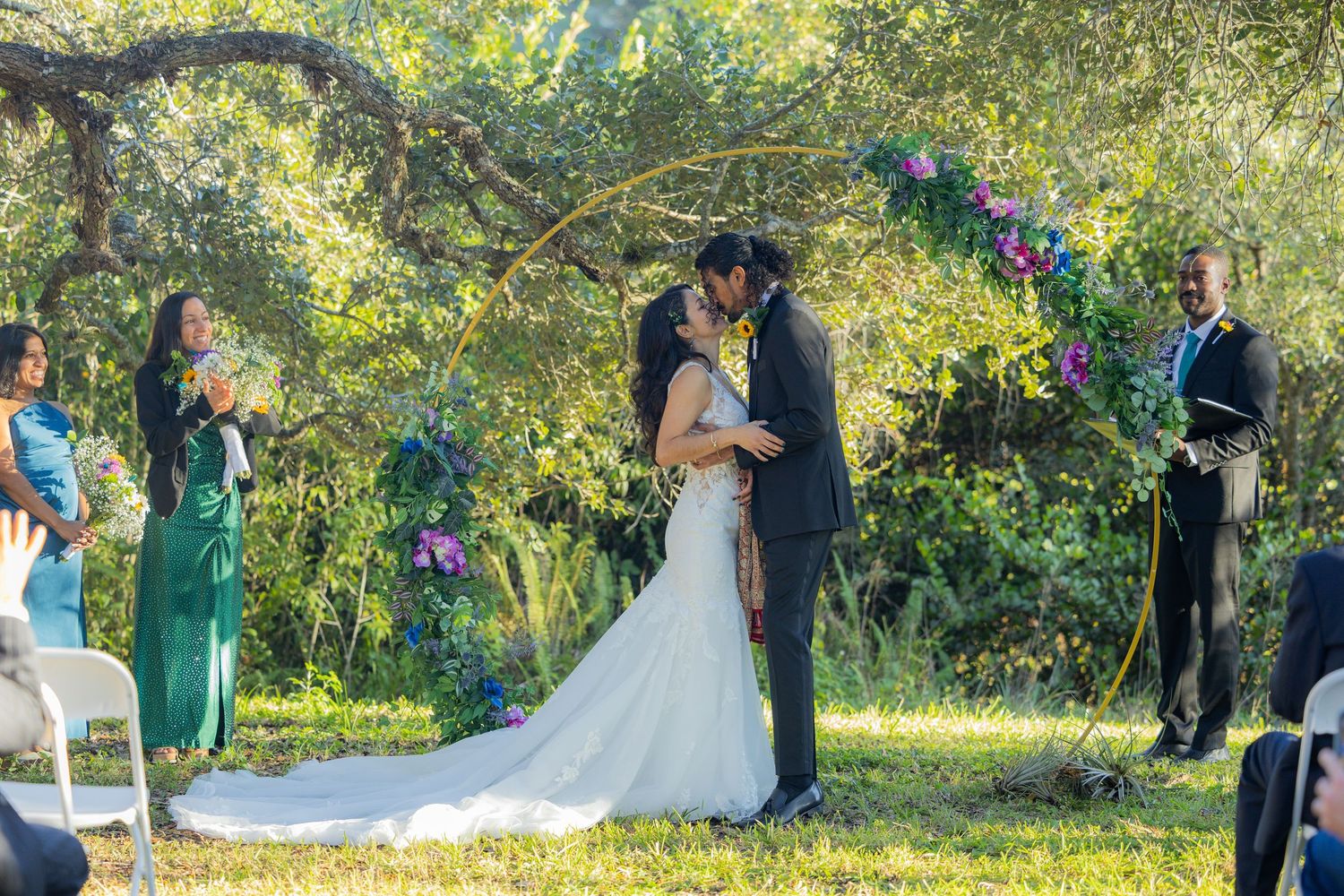 Bride and grooms first kiss at Long Key Natural Area & Nature Center