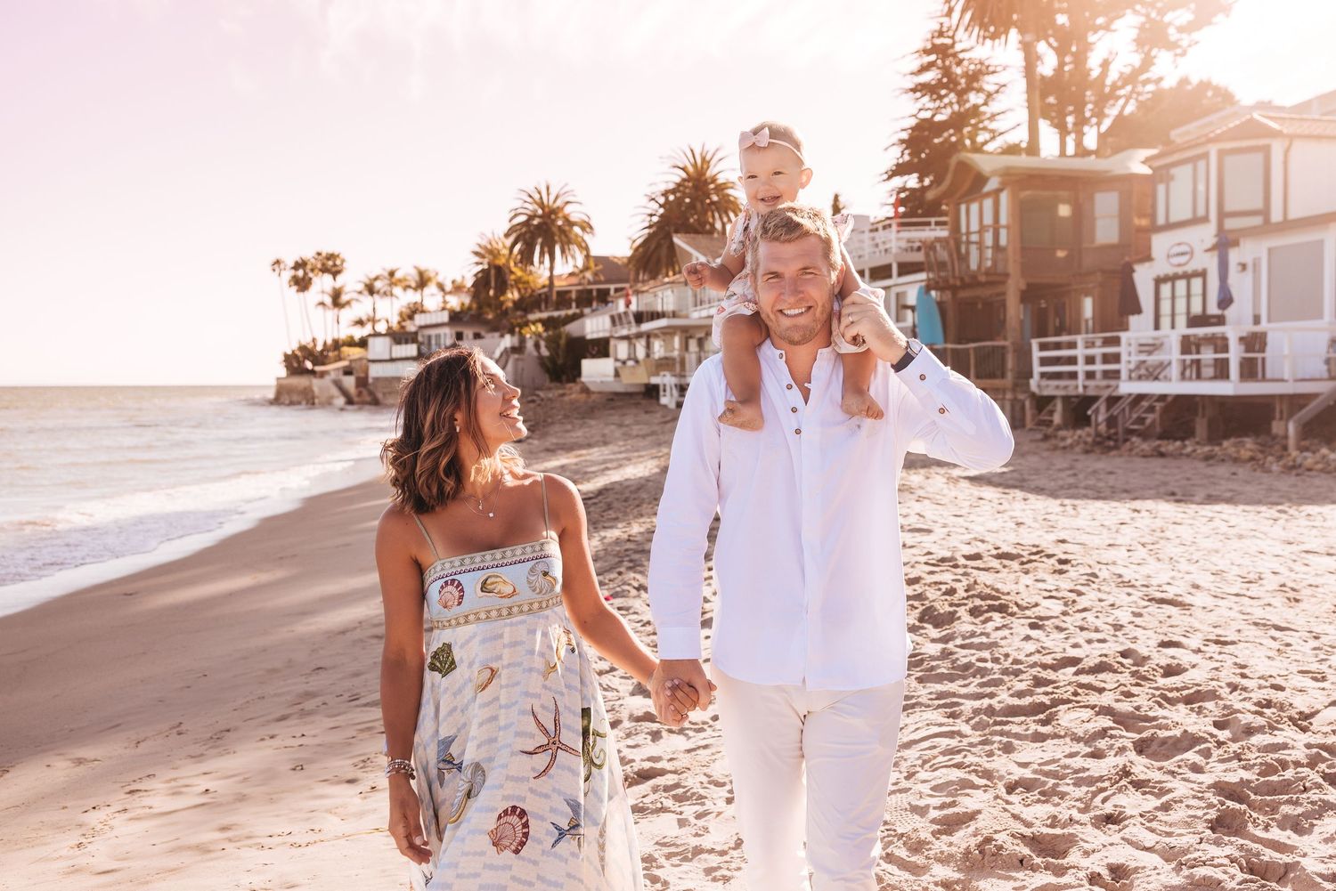 Family playing together during sunset at Miramar Beach Santa Barbara family photography session