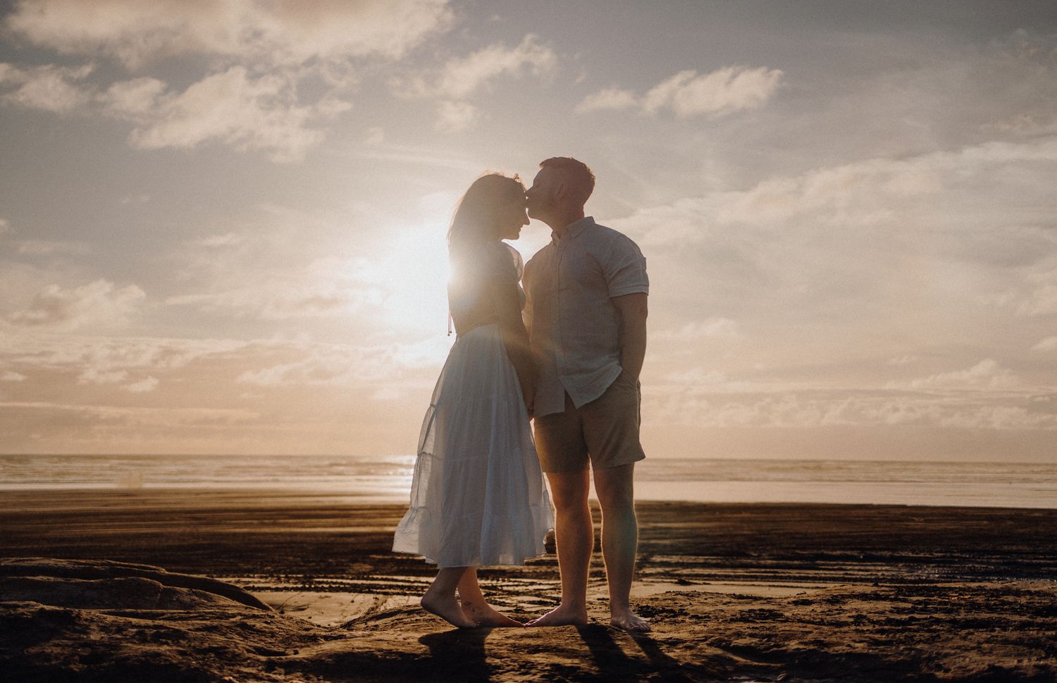 Couple in Karioitahi Beach for their engagement shoot with Apertured Media-Auckland Wedding Photographer
