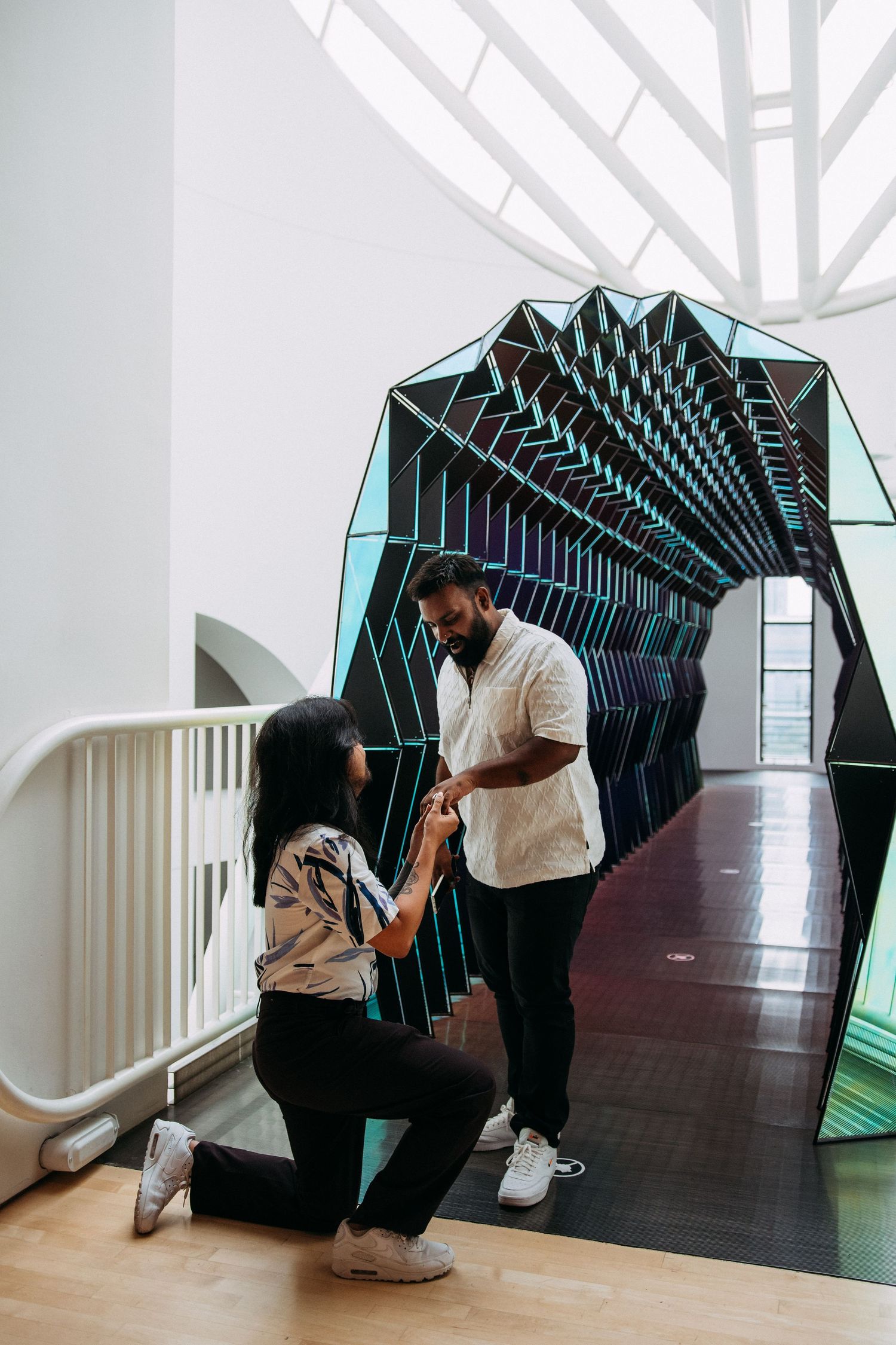 LGBTQ+ couple proposal at San Francisco Museum of Modern Art (SFMOMA).
