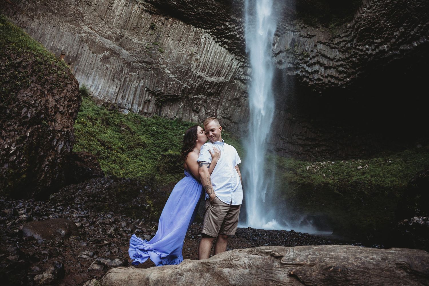 Latourell Falls cascades dramatically against dark basalt cliffs.