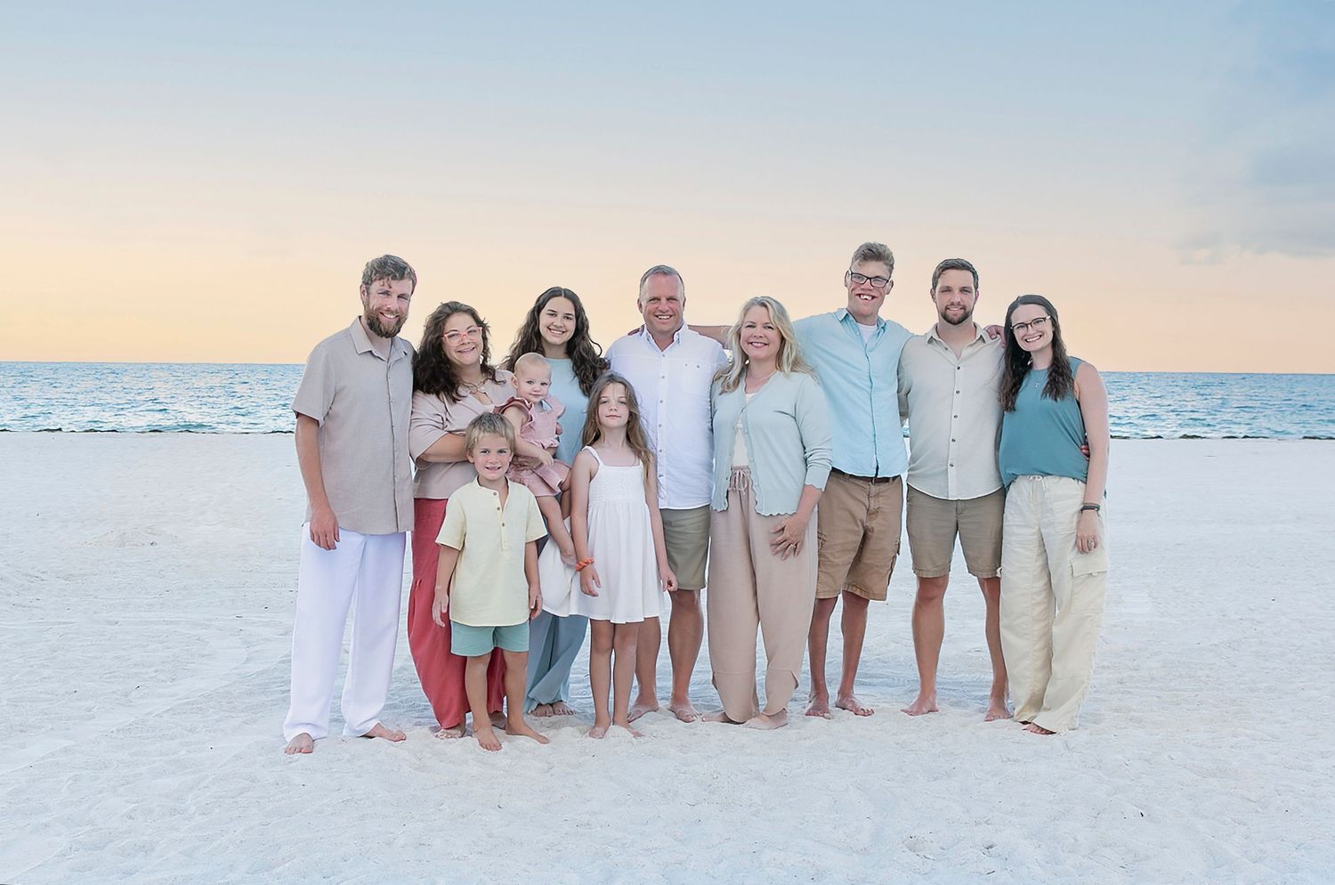 Three generation family reunion portrait on the beach at Anna Maria Island