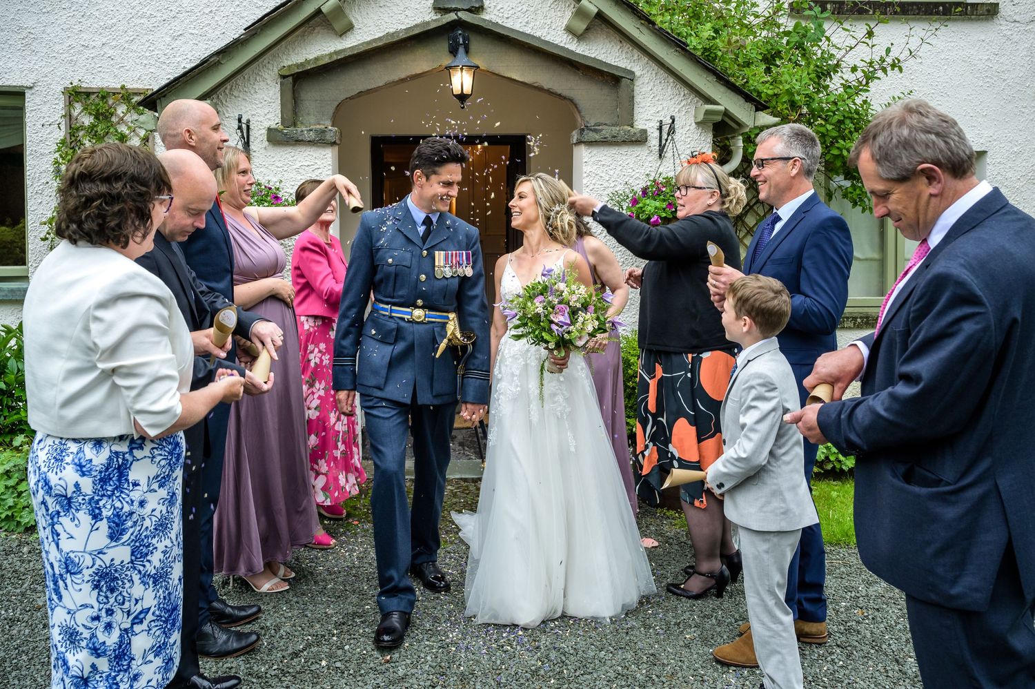 Confetti exit after wedding at Cote How Lake District Weddings