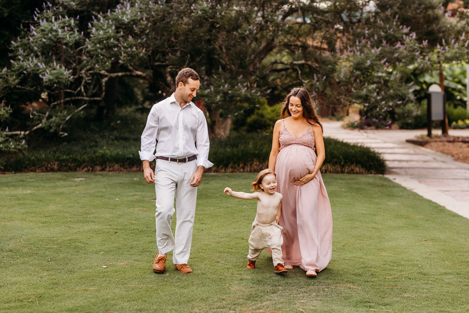 Mom in Anthropologie dress with child in H and M overalls