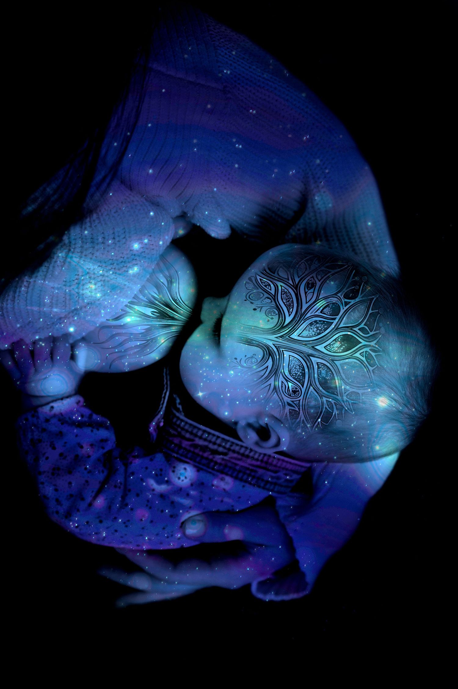 Artistic double exposure portrait with cosmic blue nebula and glowing tree of life pattern overlaid on dark background.