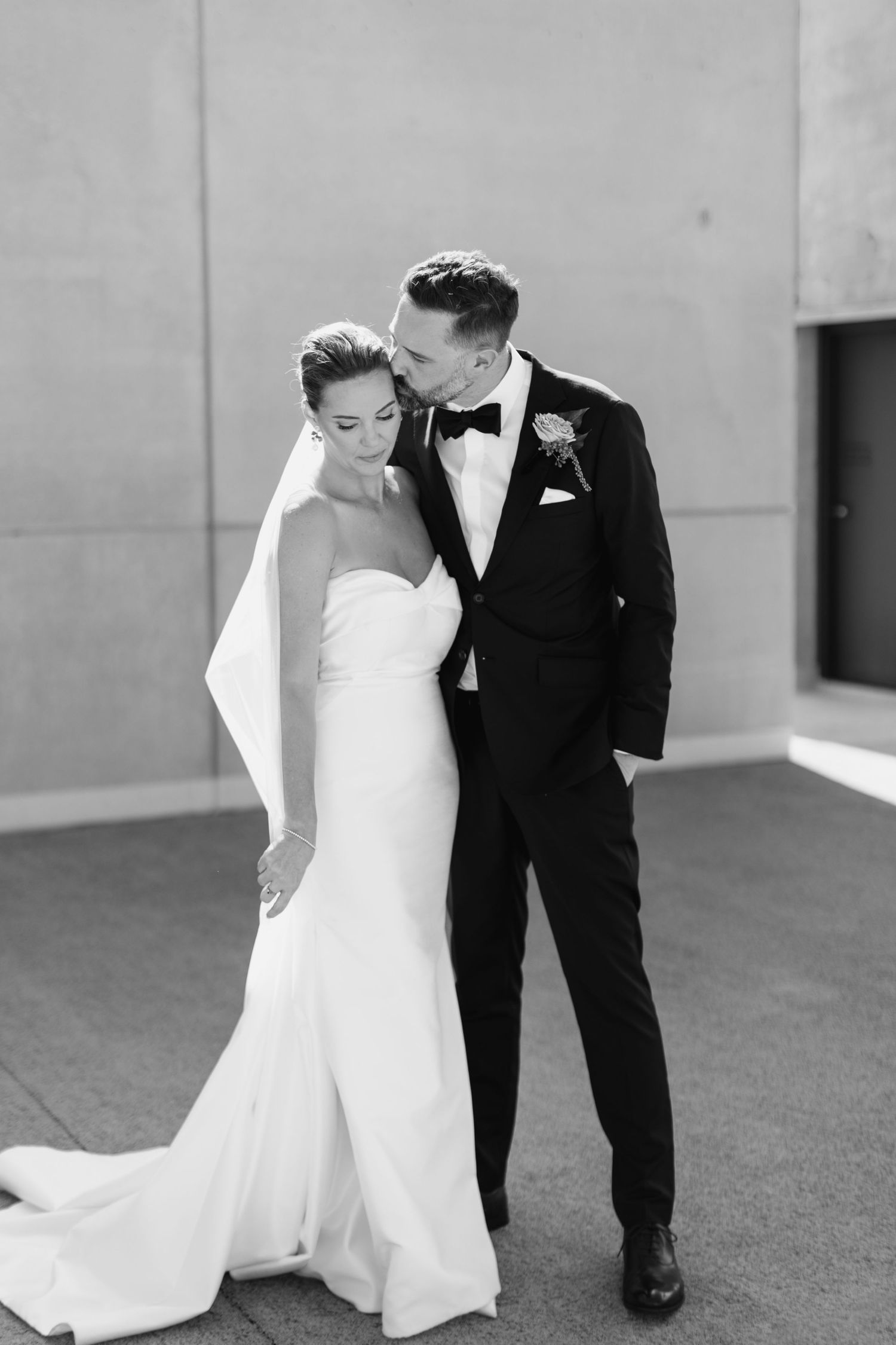 Black and white romantic wedding portrait sequence showing tender moments between bride and groom.