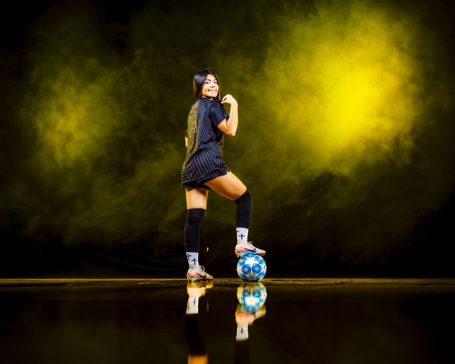 Johnson High School women’s soccer player portrait during dramatic media day in Buda TX by VC Photography