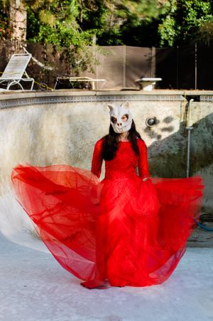 Favorite Images of 2020 with Anika Vodicka and Lenka Vodicka of Lenkaland Photography. Creative Skeleton wearing Red