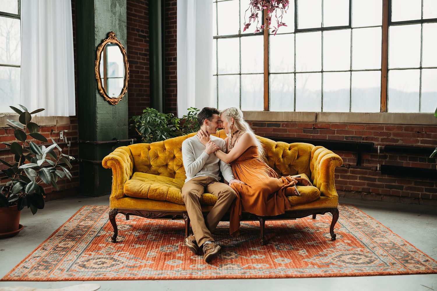 Couple on couch in Akron Ohio taken by Jessica Hepp Photography