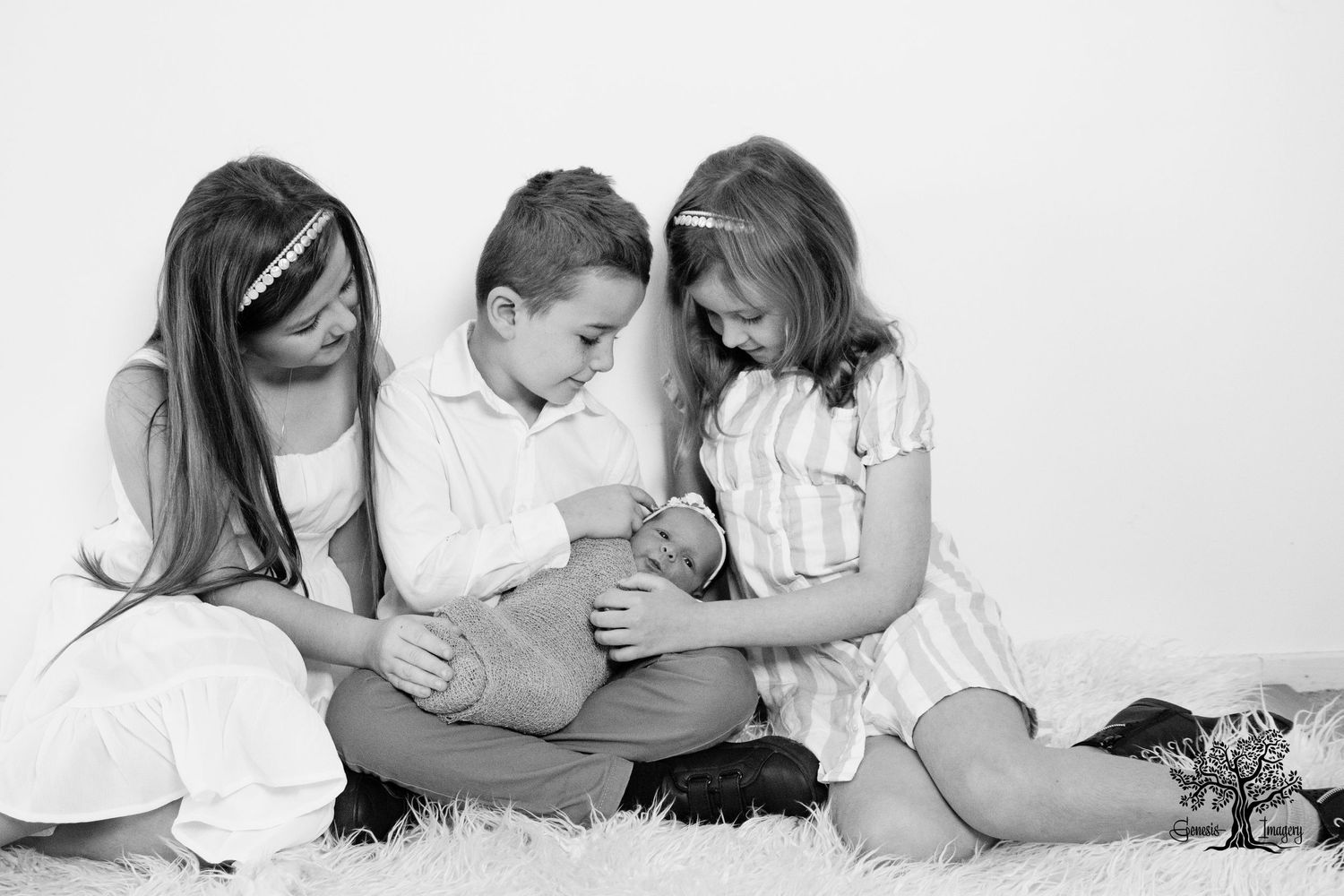 Sibling and newborn photography Gold Coast capturing the first bond.