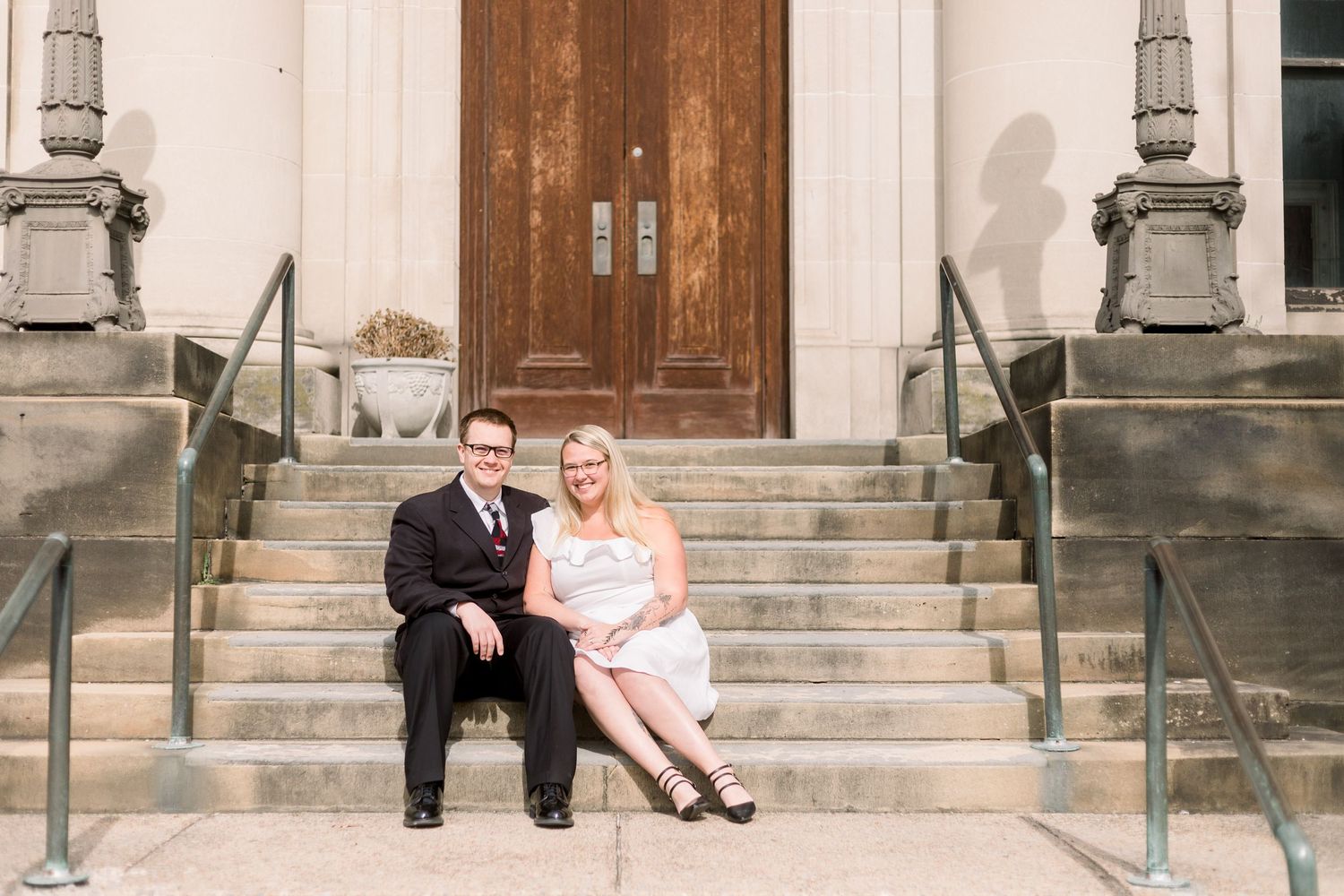 A romantic photo sequence on classic stone steps of a historic building.