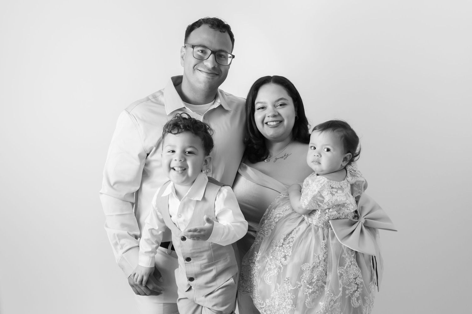 Timeless studio portraits for families in Swansboro, NC, serving Emerald Isle and Jacksonville. Simple, classic photography designed as wall