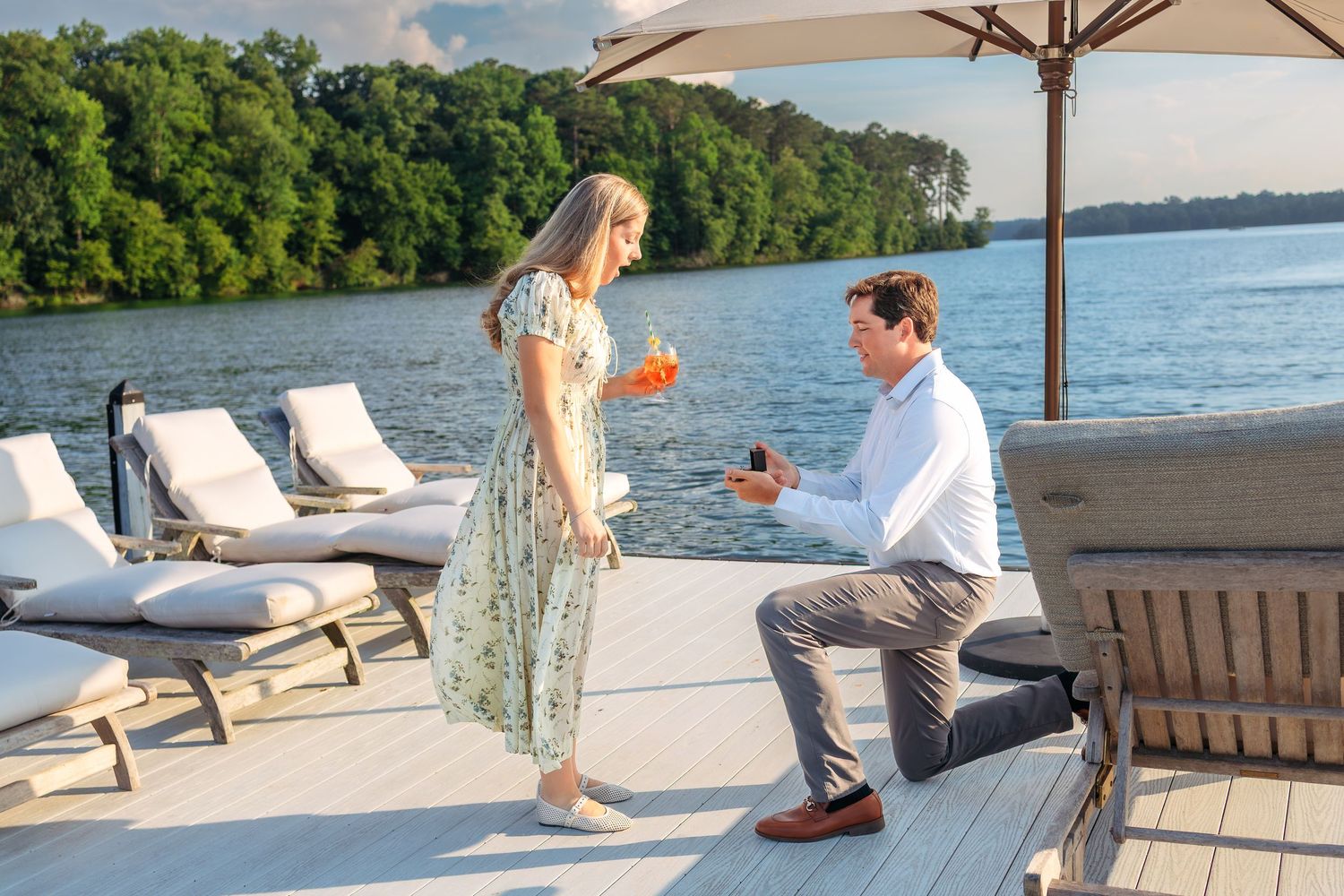 Lake Oconee proposal photographer capturing a surprise engagement on a lakeside dock in Georgia