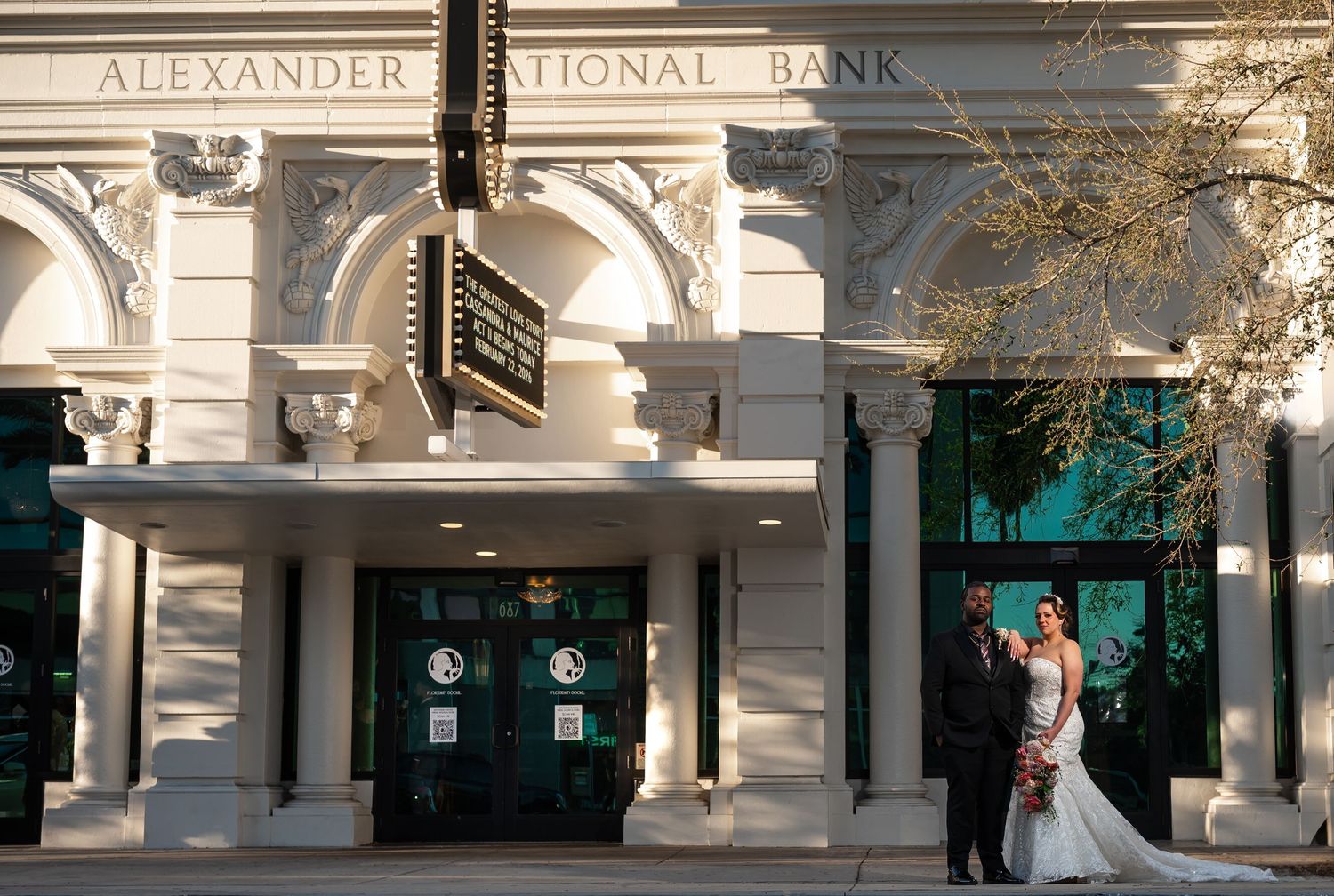 The couple standing in front of the Floridian Social was captured by luxury wedding photographers in Florida.