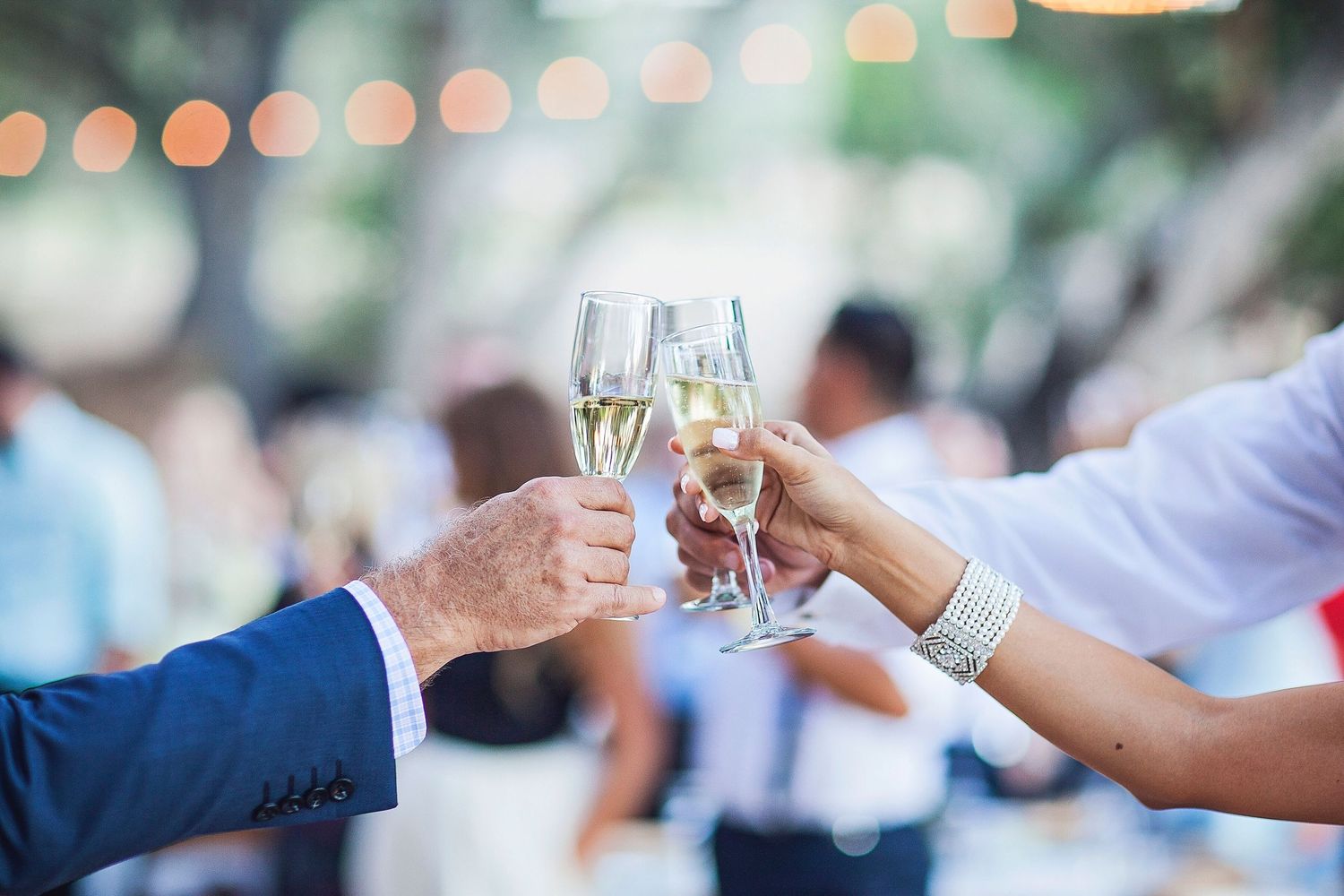 Bride and Groom toasting with parent