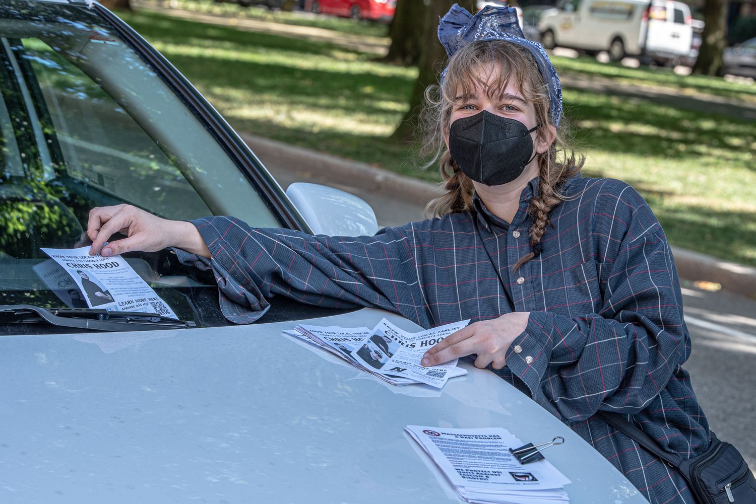 New England Antifascist Action distributing flyers informing community of neo-nazis in Boston
