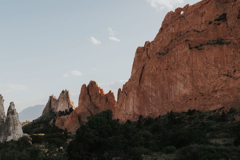 The striking features of the rock formations in Garden of the Gods, backlit by a bright summer sun