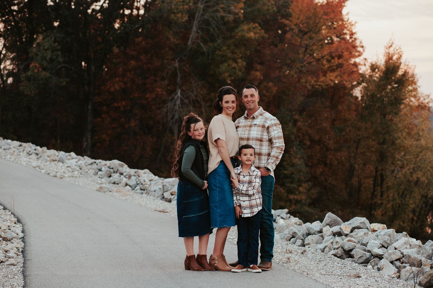 family portrait on a sidewalk
