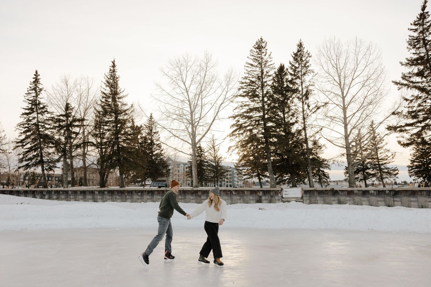 couple skating on sylvan lake