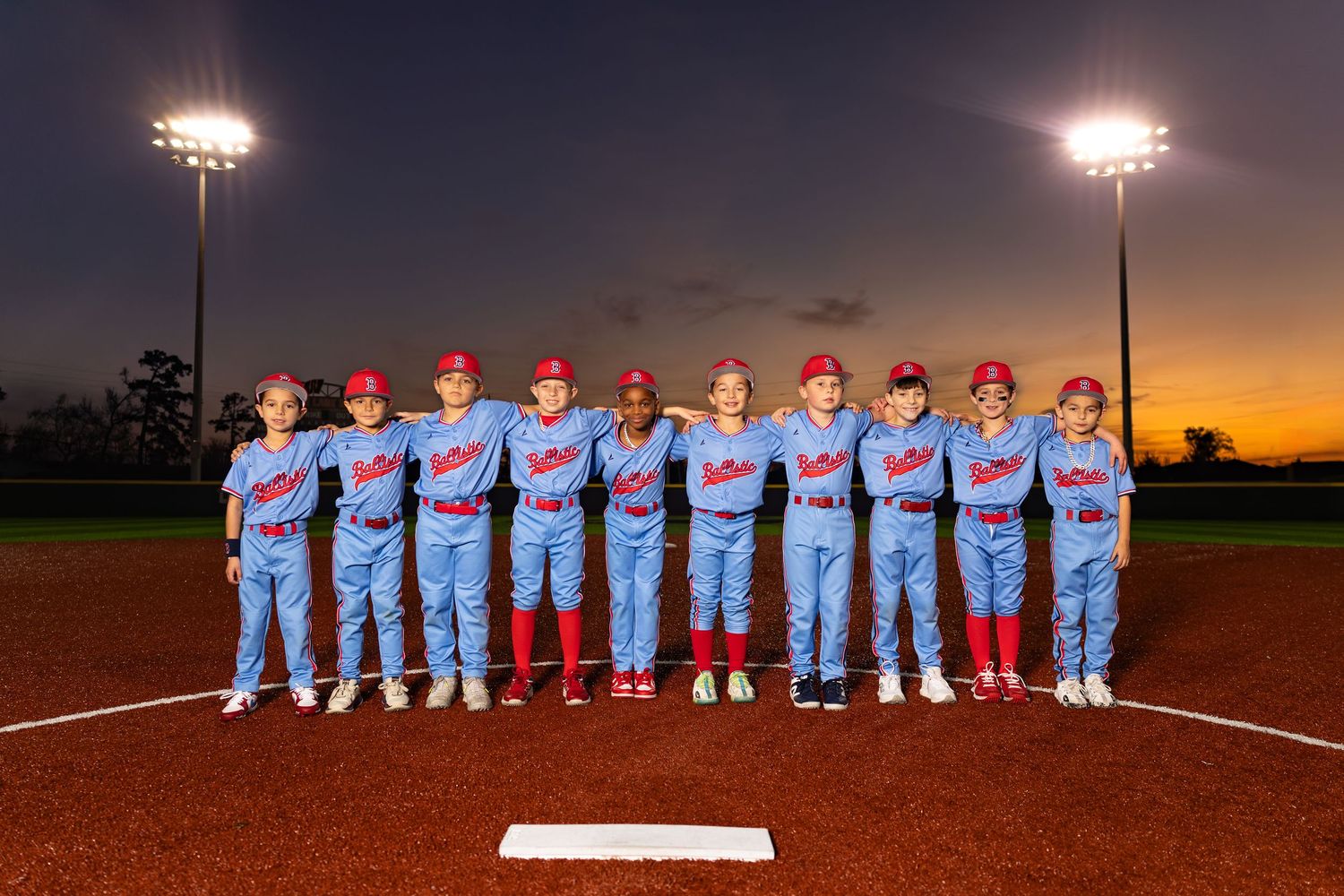Youth baseball portrait using off-camera flash during a team media day in Lake Charles, LA. Ballistics at Westlake High School Field