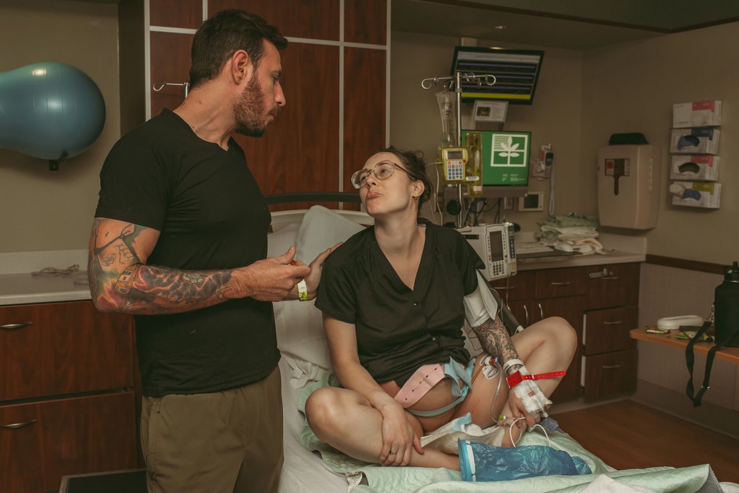 Mom and Dad having a moment before baby boy arrives at a local Virginia hospital.