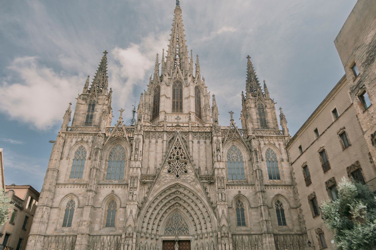 Stunning Gothic architecture of Barcelona Cathedral with ornate spires and detailed stone carvings.