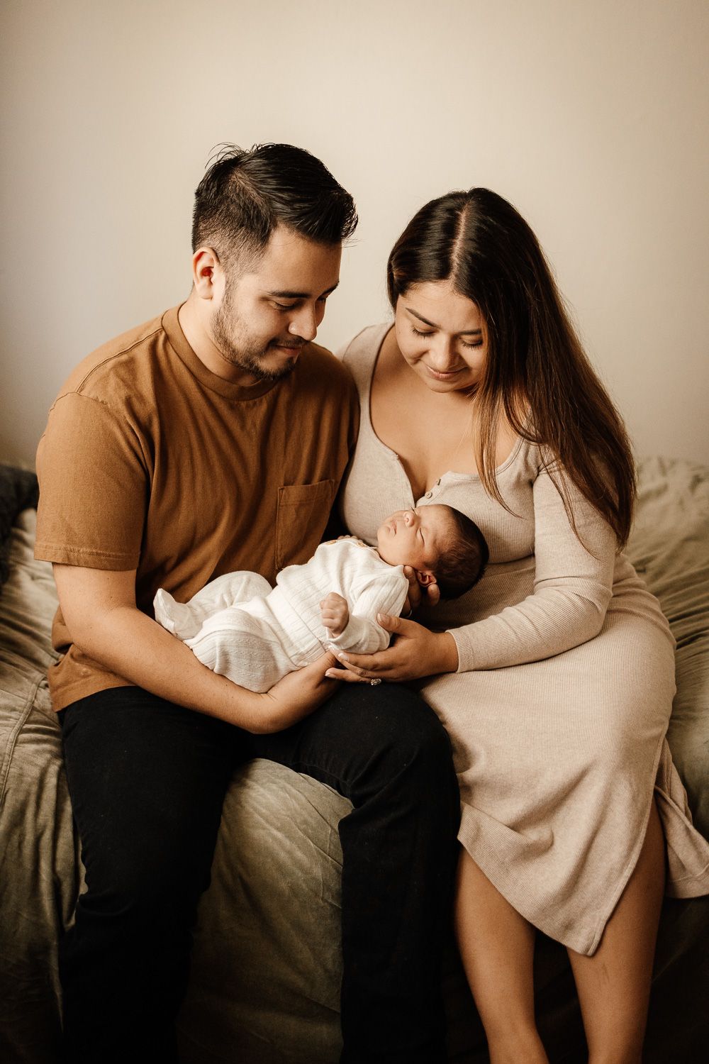 San Jose family poses for a lifestyle in-home newborn photo session with Newborn Photographer Cindy Tucey in San Jose