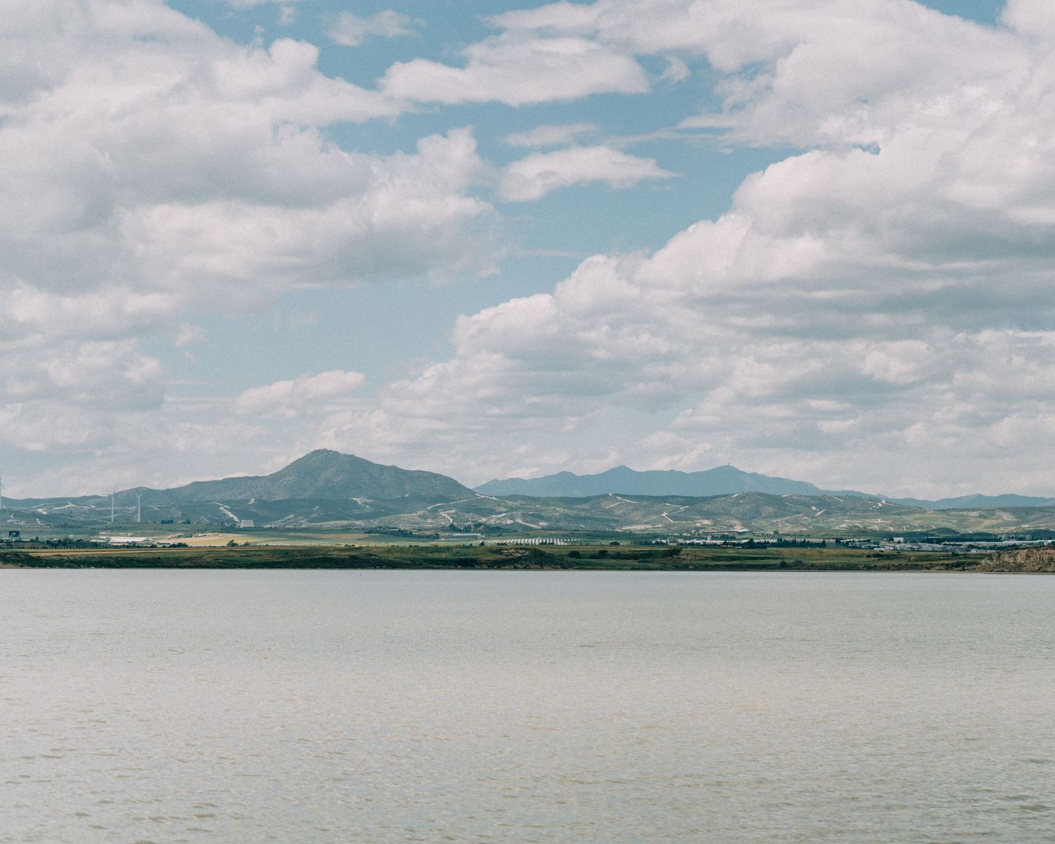 A panoramic View of Stavrovouni mountain Rising at the Larnaca Salt Lake's Horizon