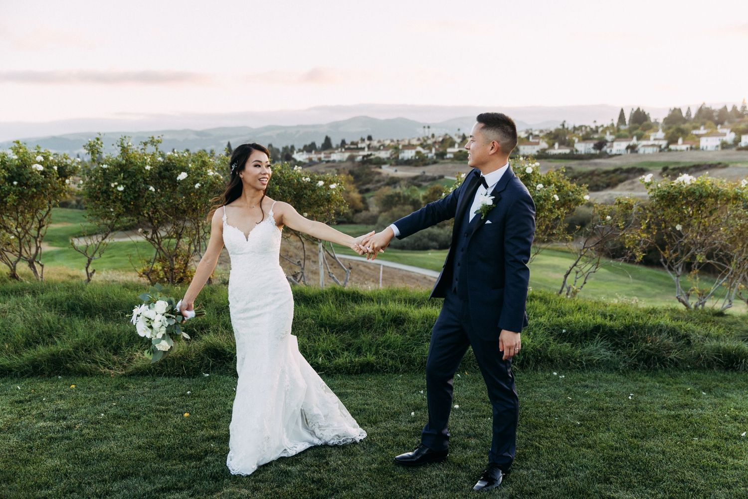 Asian bride and groom photographed at East Bay wedding venue by best wedding photographer in Bay Area.