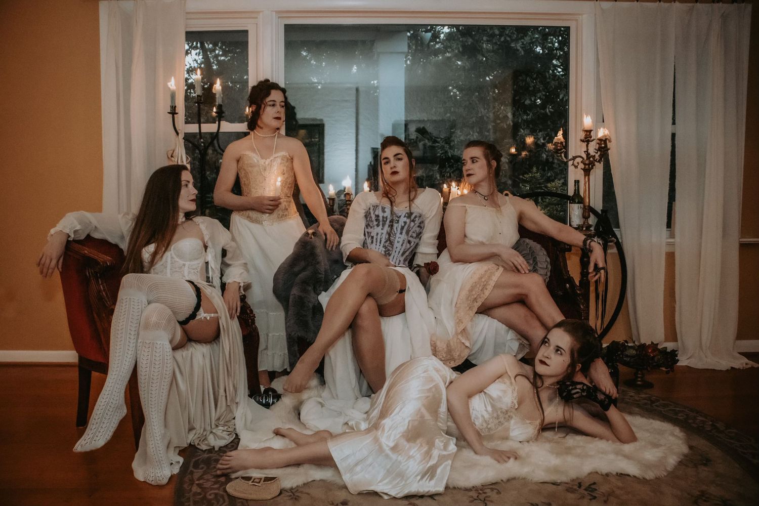 A group of women dressed in 1800s undergarments