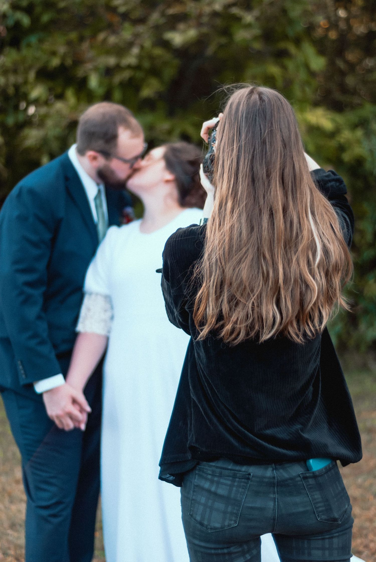 Photographing couple after wedding in Bowling Green, Kentucky image by second photographer