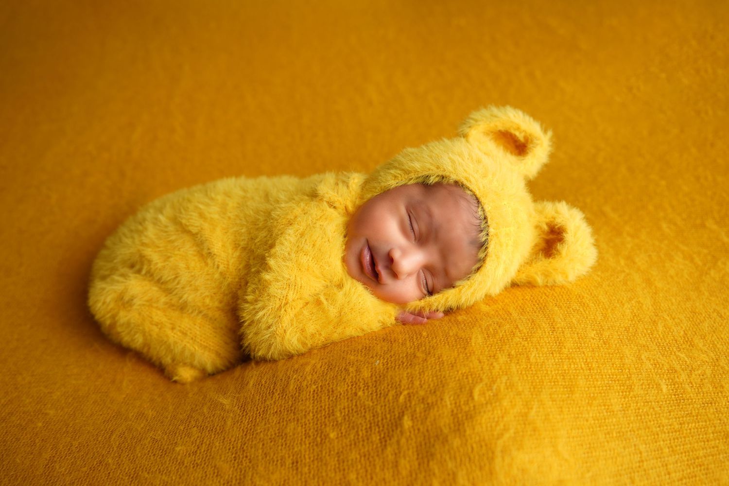 Professional new born photoshoot Dubai capturing the first days of a baby’s life.