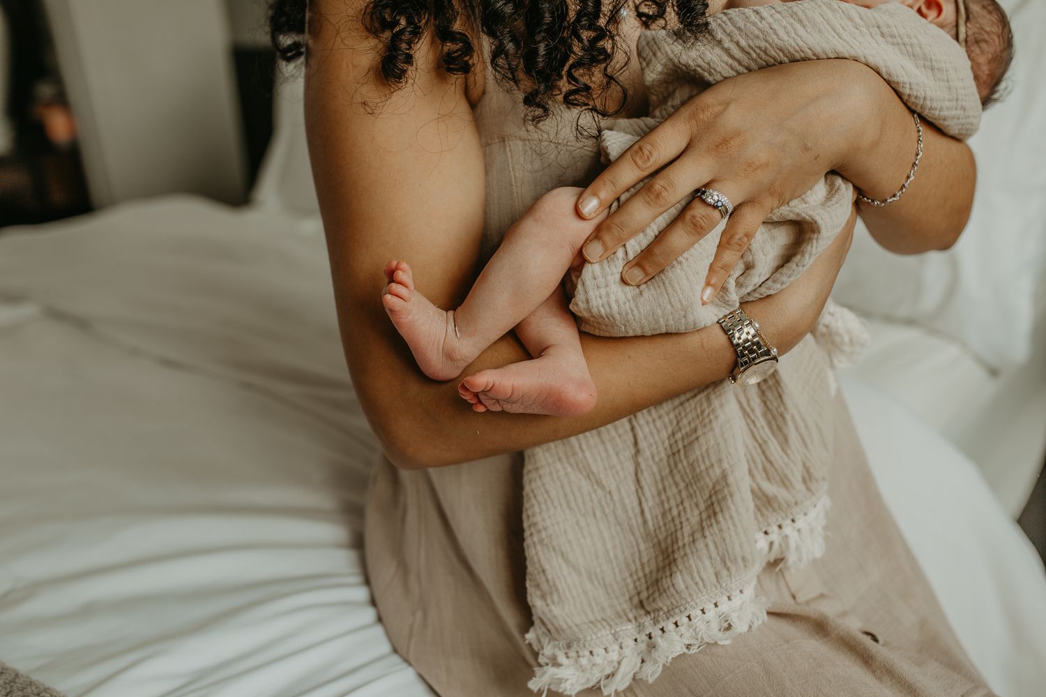 At-home newborn photography with parents in London