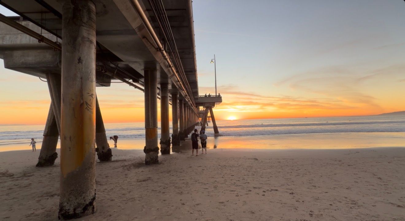 A series of panoramic photos showing a beach pier at sunset with golden sky reflecting on wet sand.