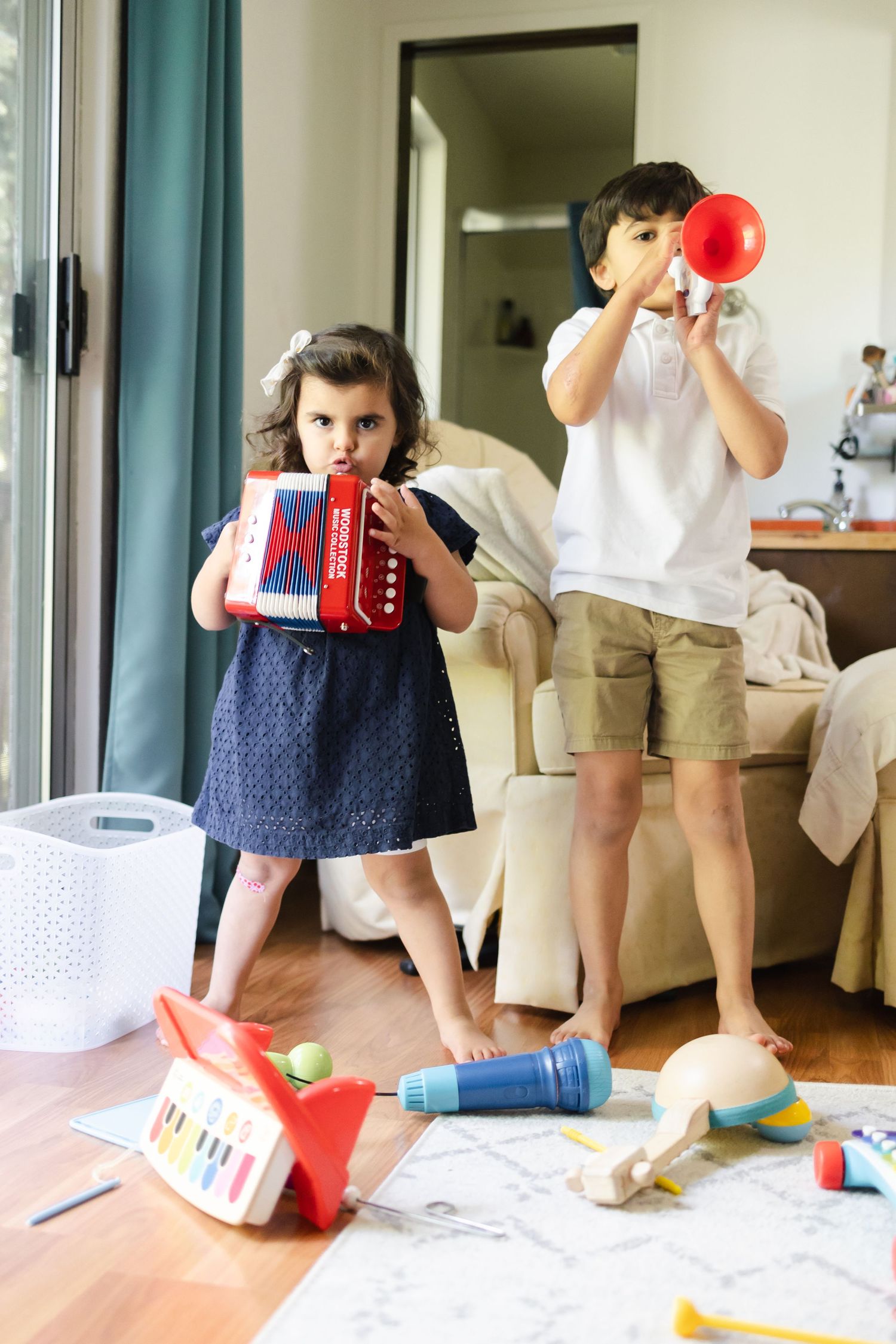 A series of six connected photos showing a family relaxing and playing together in a bright, modern living room.
