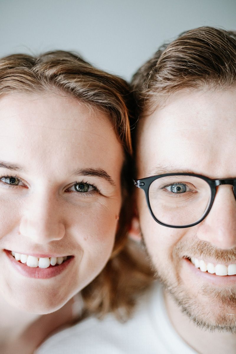 A series of cropped facial features showing eyes, smiles and glasses in a horizontal arrangement.