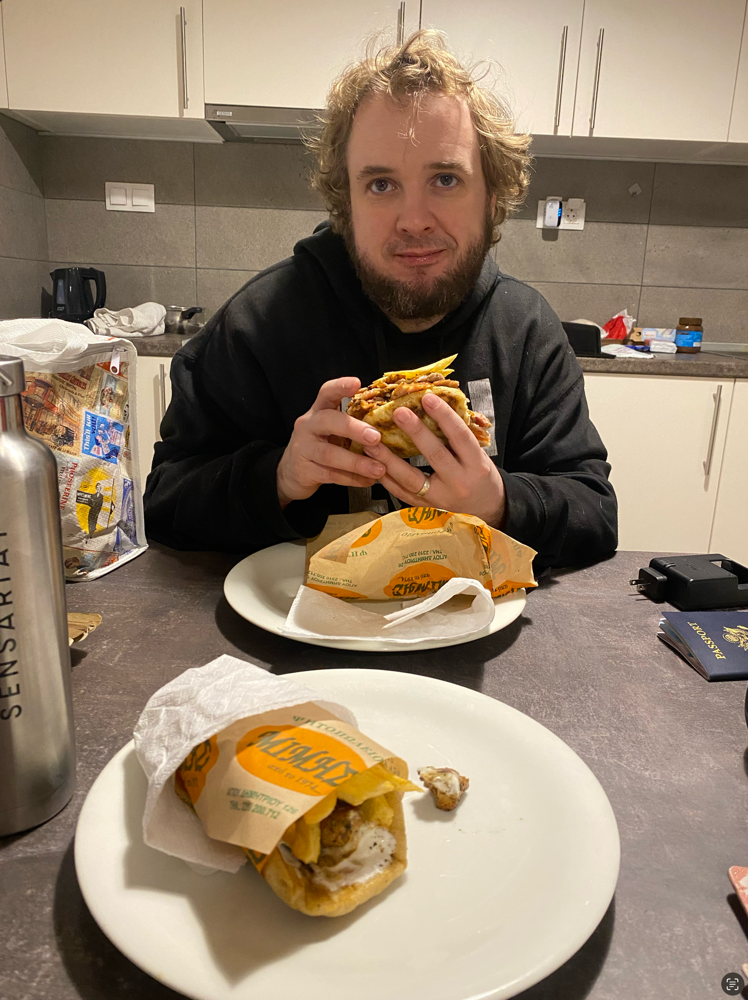 A series of photos showing someone eating a sandwich and chips on a white plate at a casual dining counter.