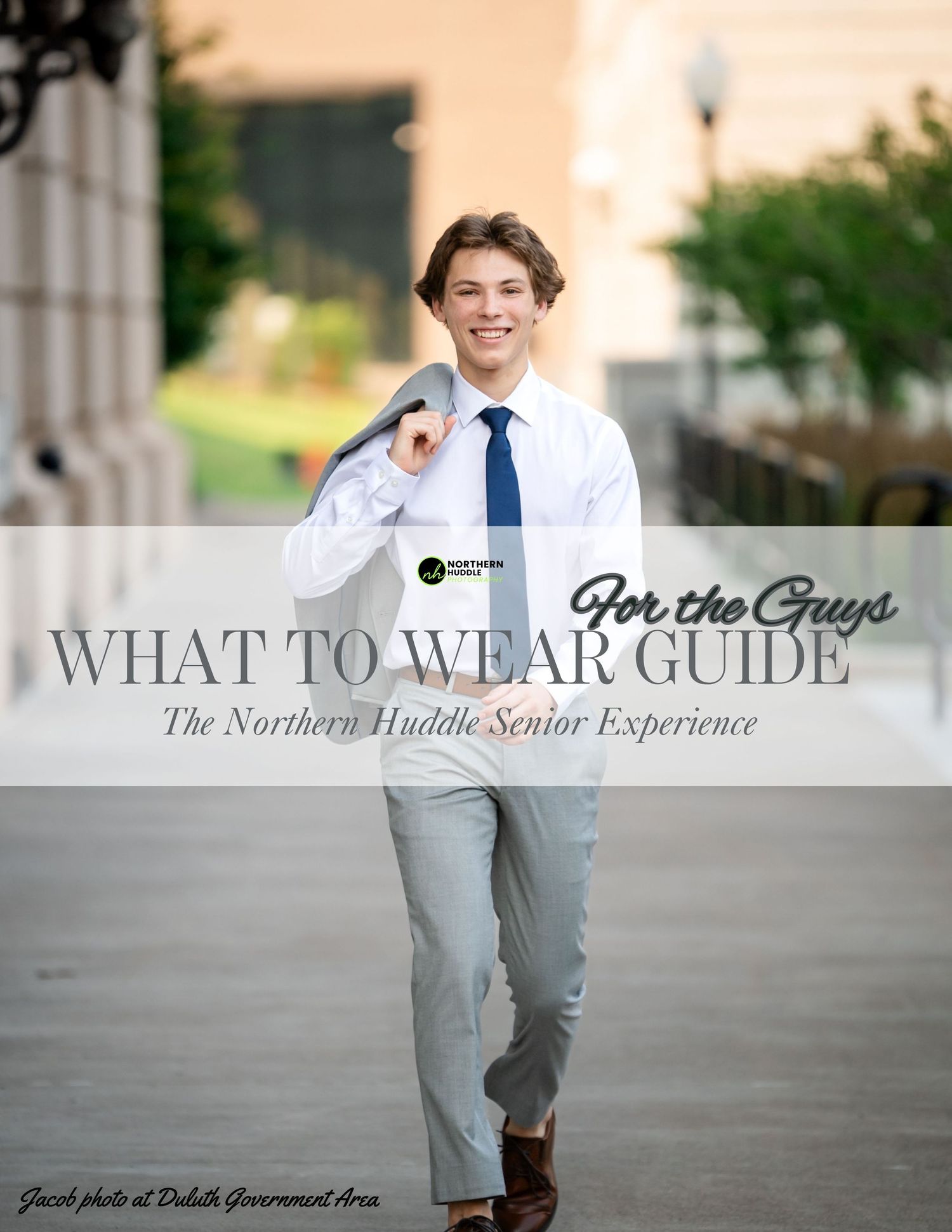 High school senior posing outdoors in Duluth, Minnesota, wearing a casual button-down shirt during a senior photo session